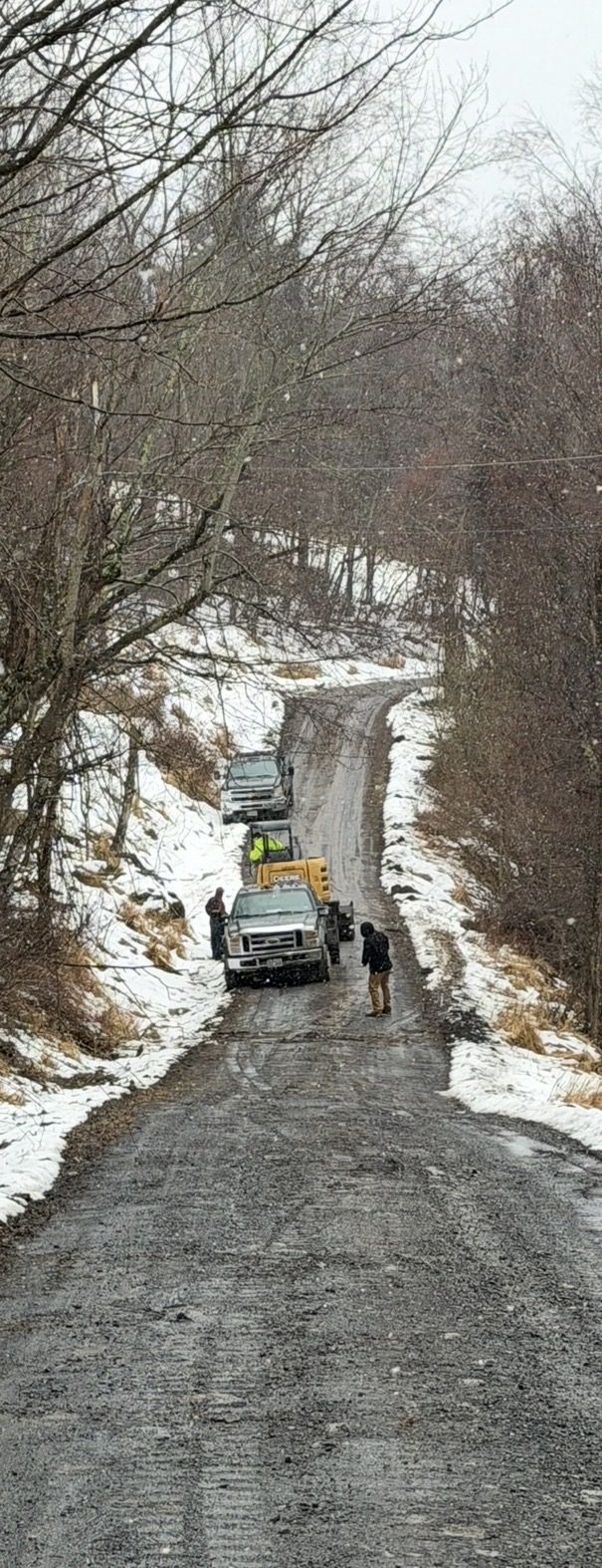 Road and equipment arriving for Twin Ridge Retreats site work